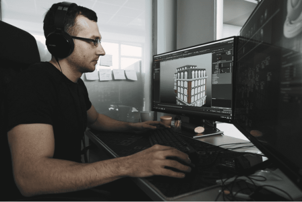 homme utilisant un logiciel d’animation 3d